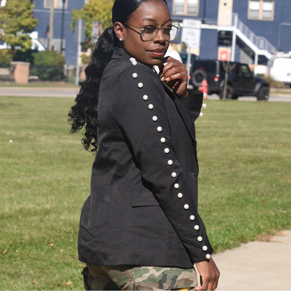 Black Blazer with pearl detail.